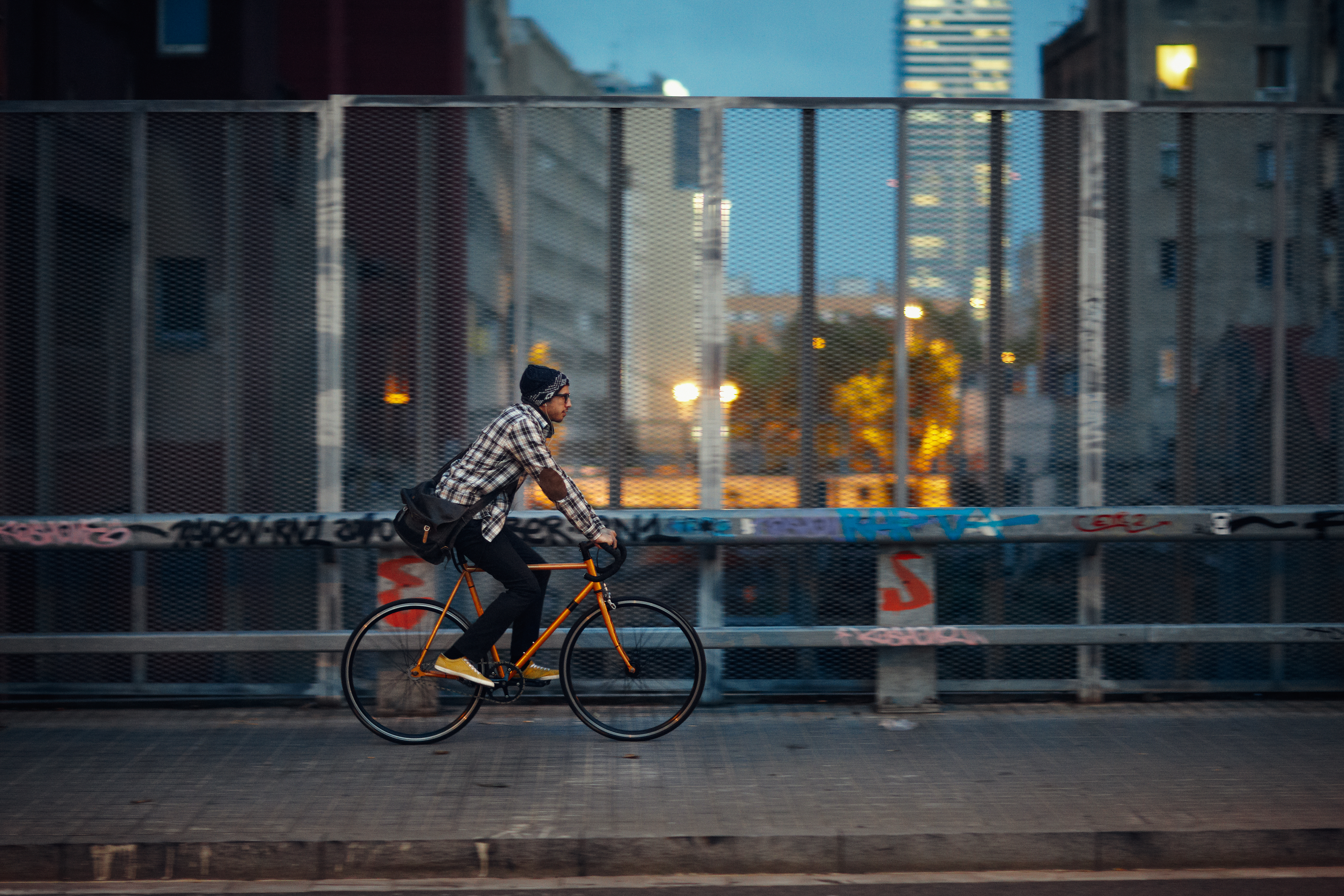 Men cycling on street