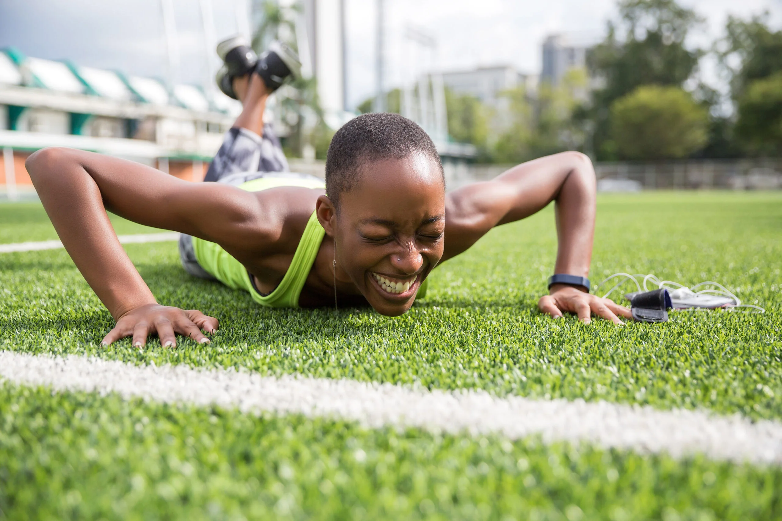 A women exhausted and happy after physical activity