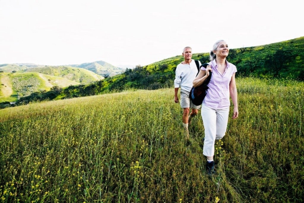 Caucasian couple hiking