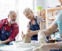 Couple making pottery