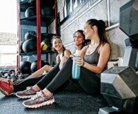 Girls chatting during a break in gym