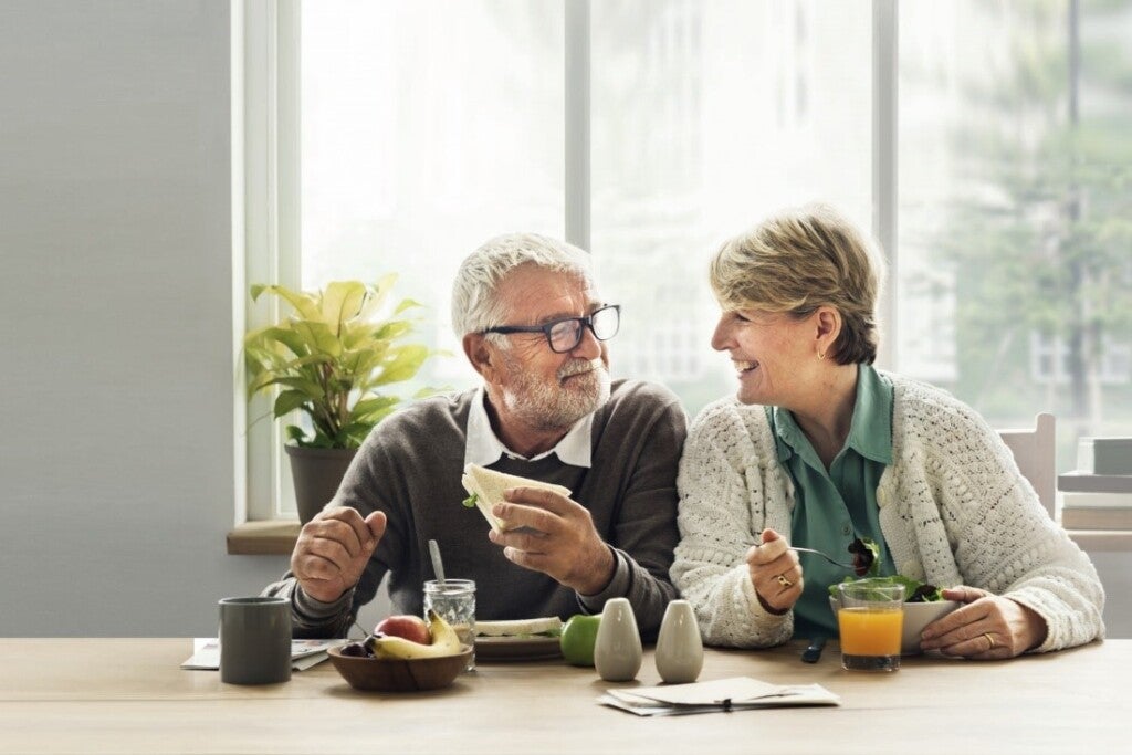 Couple talking over breakfast