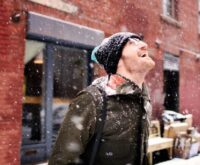 Man enjoying snowfall