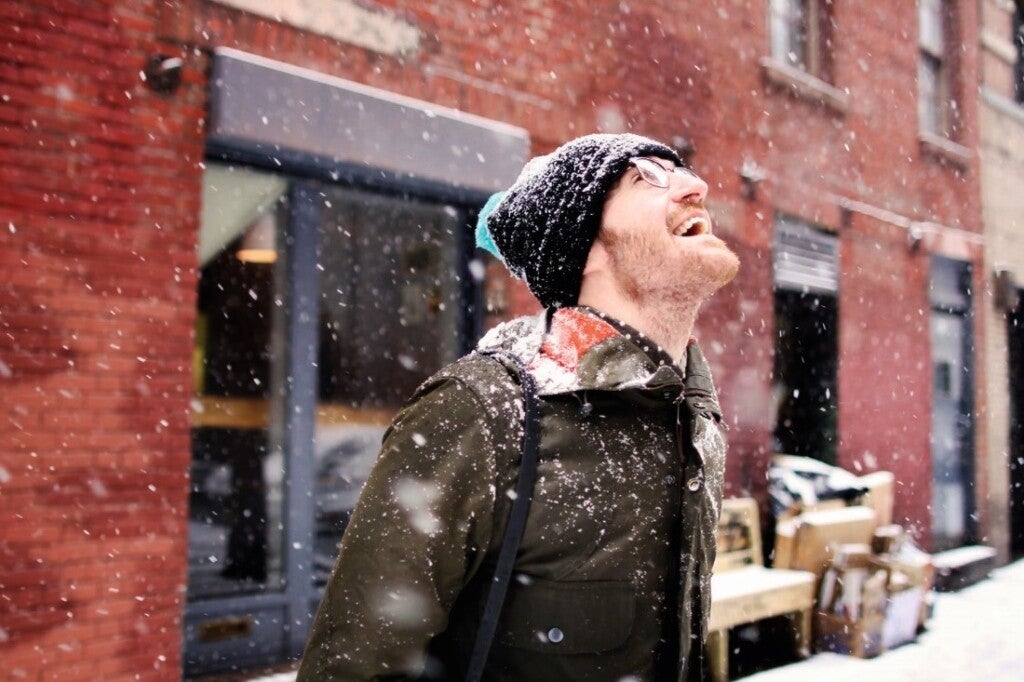 Man enjoying snowfall